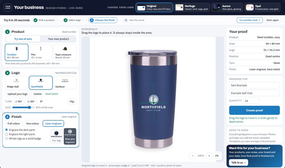 The Design Studio with a logo engraved on a navy steel tumbler and a live proof summary